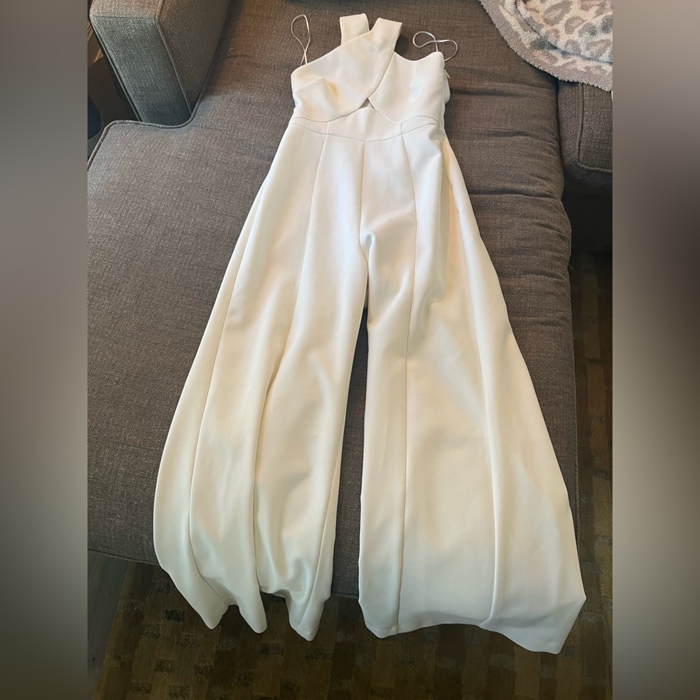 Likely white jumpsuit